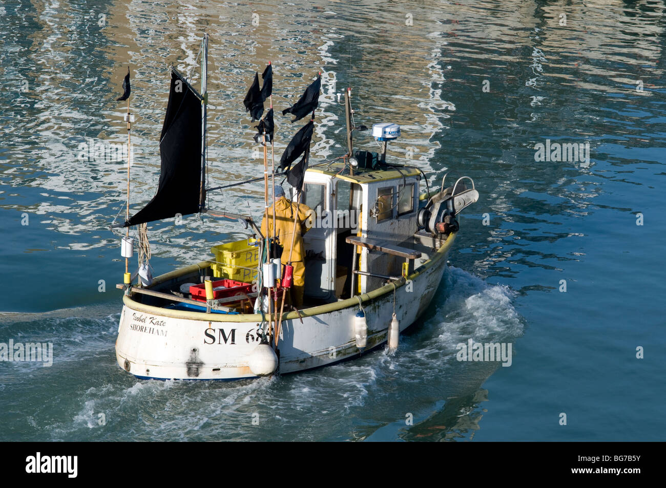 Fisherman in boat fishing hi-res stock photography and images - Alamy