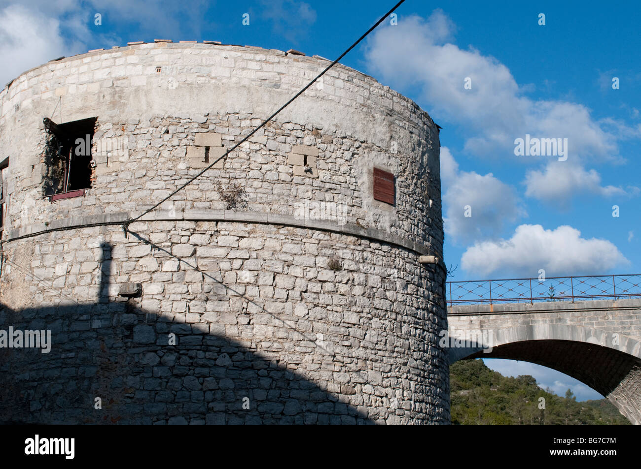 Viaduct arch and medieval tower, St HippolyteduFort, Gard, South of