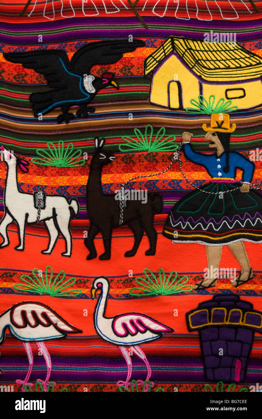 Peru, Sacred Valley, Pisac Village, textiles for sale in local market Stock Photo