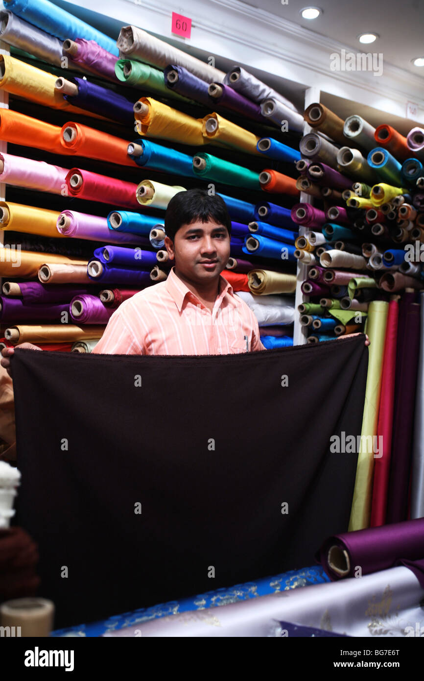 A textile shop in Doha, Qatar. A huge range of textiles is available from numerous shops Stock Photo