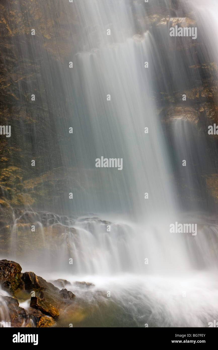 Cascading water of a waterfall Stock Photo