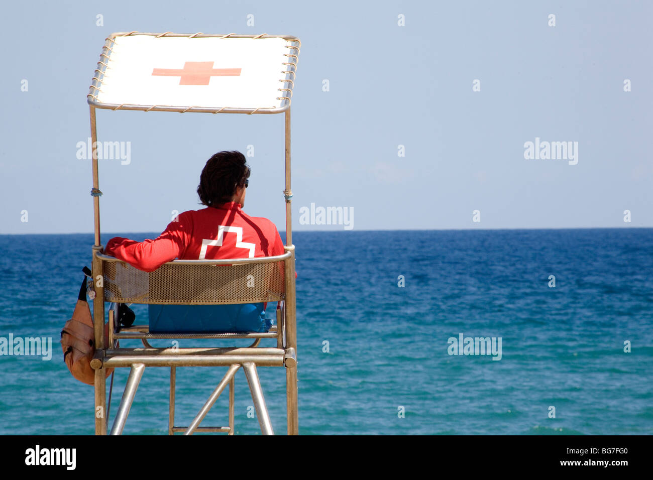 LIFEGUARD, BARCELONA: Beach lifeguard sat watching the beach Barceloneta sea Barcelona Spain Stock Photo