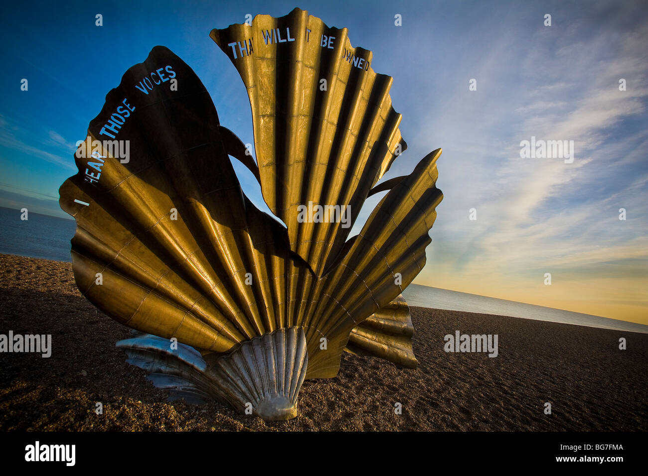 The Scallop Scupture dedicated to Benjamin Britten by artist Maggi Hambling on Aldeburgh beach on the Suffolk Coast East Anglia Stock Photo