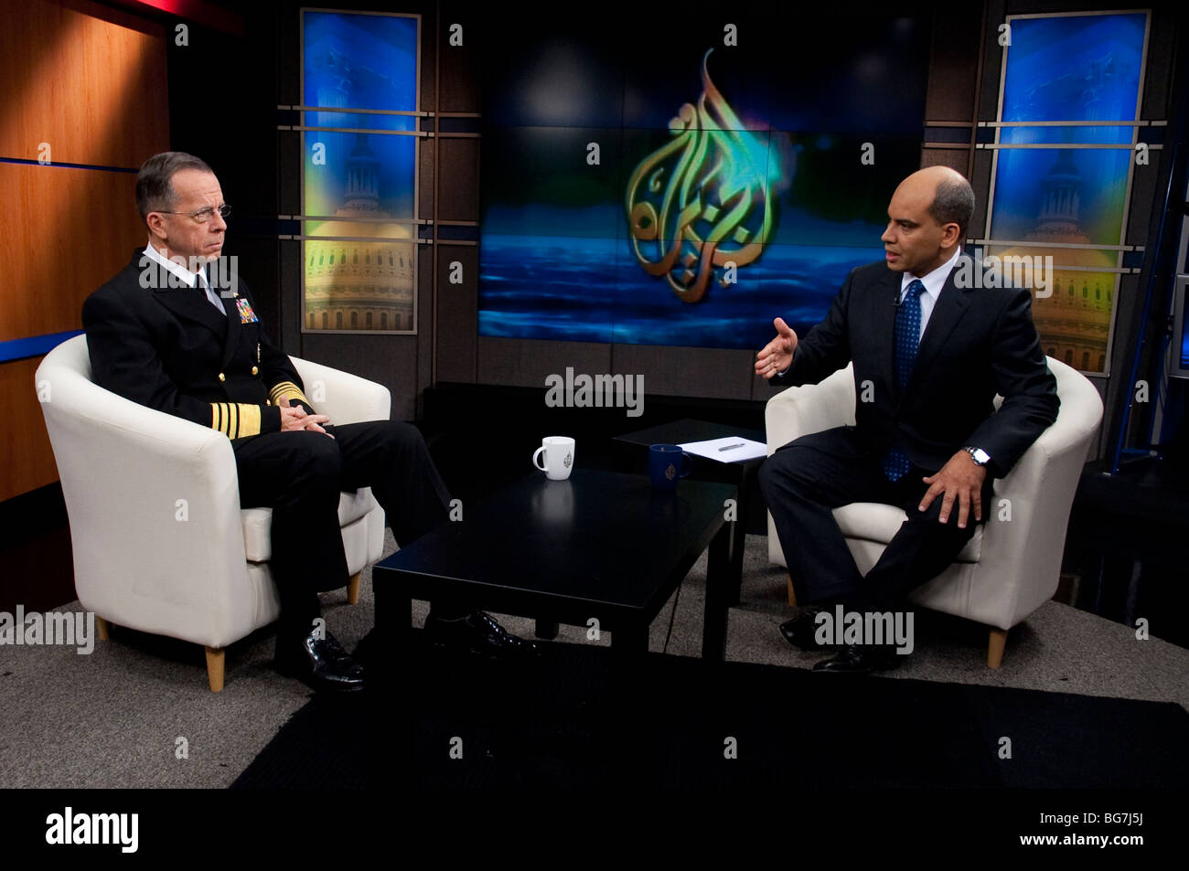 Staff Navy Adm. Mike Mullen interviewed by Abderrahim Fouka, of the Al Jazeera television network. Stock Photo