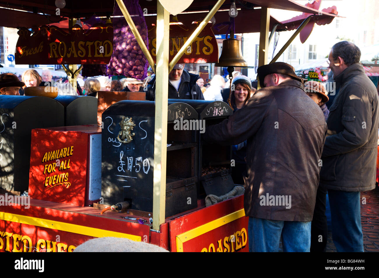 Roast Chestnut Seller at the Christmas Market Knaresborough Yorkshire England Stock Photo