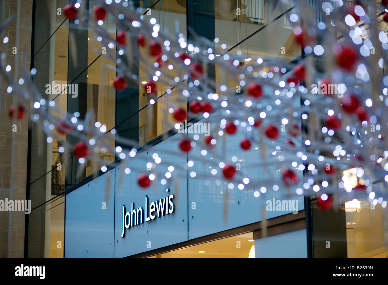 The John Lewis store in the Grand Arcade, Cambridge, with Christmas decorations. Cambridge, England,UK Stock Photo