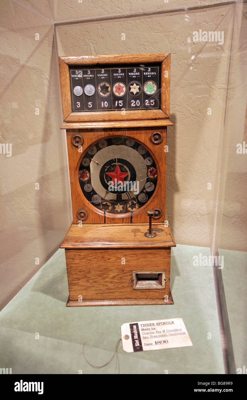 Three Spindle gambling machine on display at the Nevada State Museum, Carson City, Nevada. Stock Photo