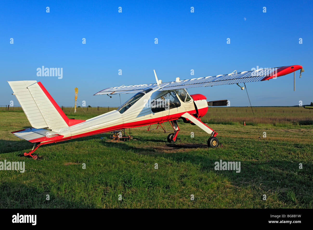 Light aircraft planes parked at a grass airfield, Russia Stock Photo Alamy