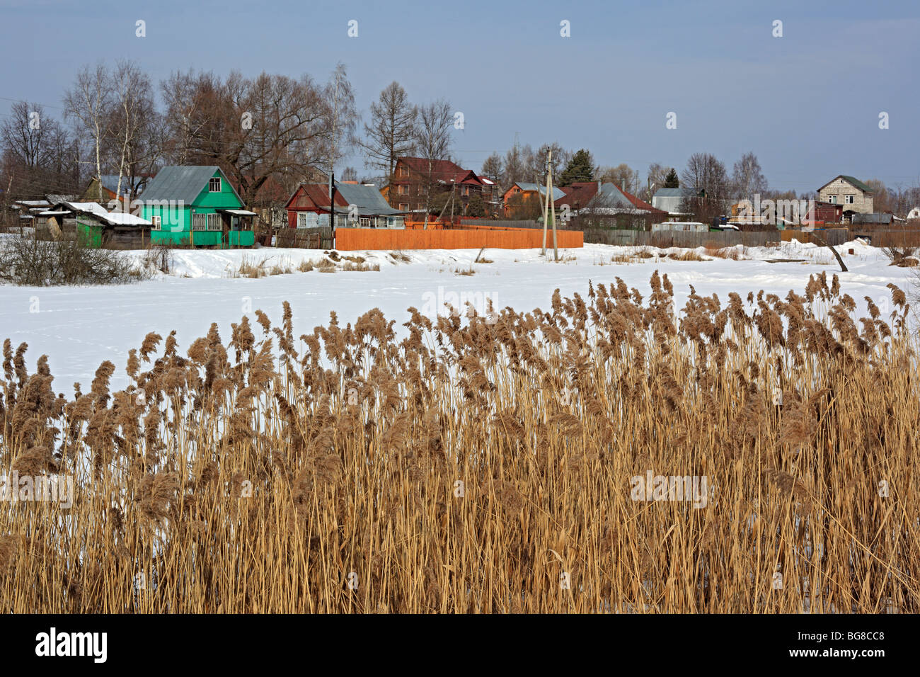 Rural cottages at winter, Russia Stock Photo