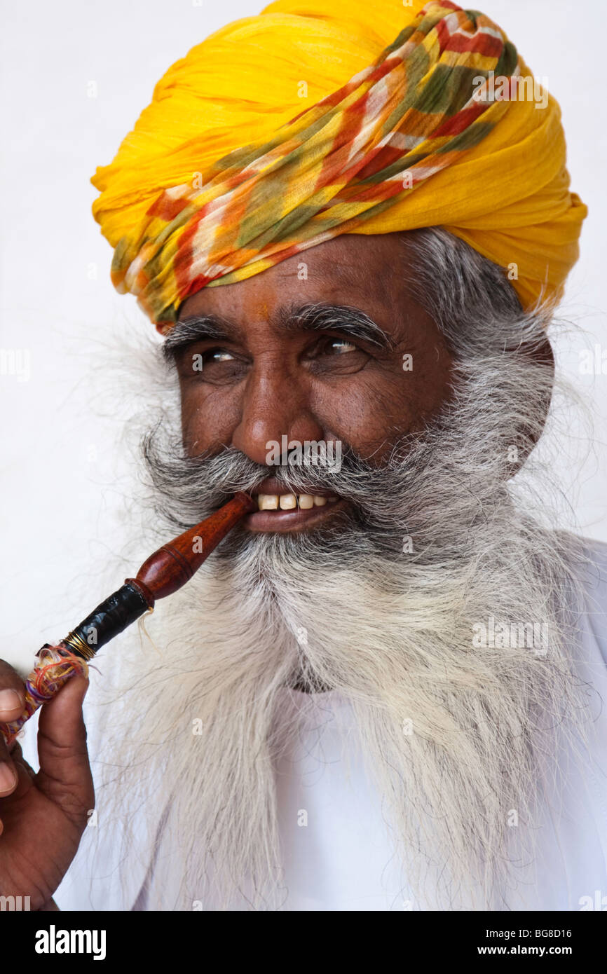 Indian man smoking hookah pipe Stock Photo Alamy