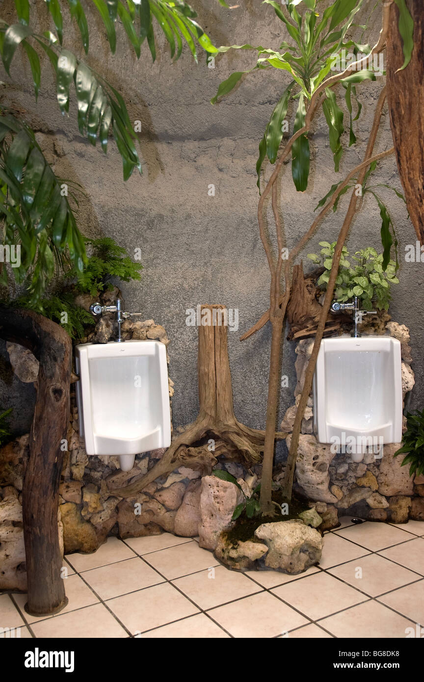 Open-air Urinals in a men's room at a restaurant in Mae Sot, Thailand Stock Photo