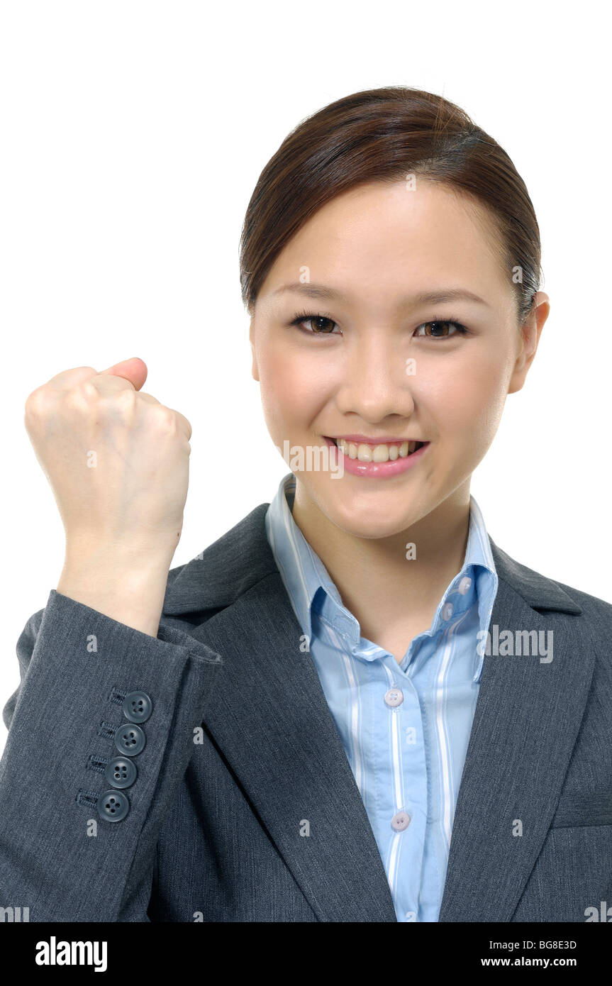 Businesswoman clenching her fist Stock Photo Alamy