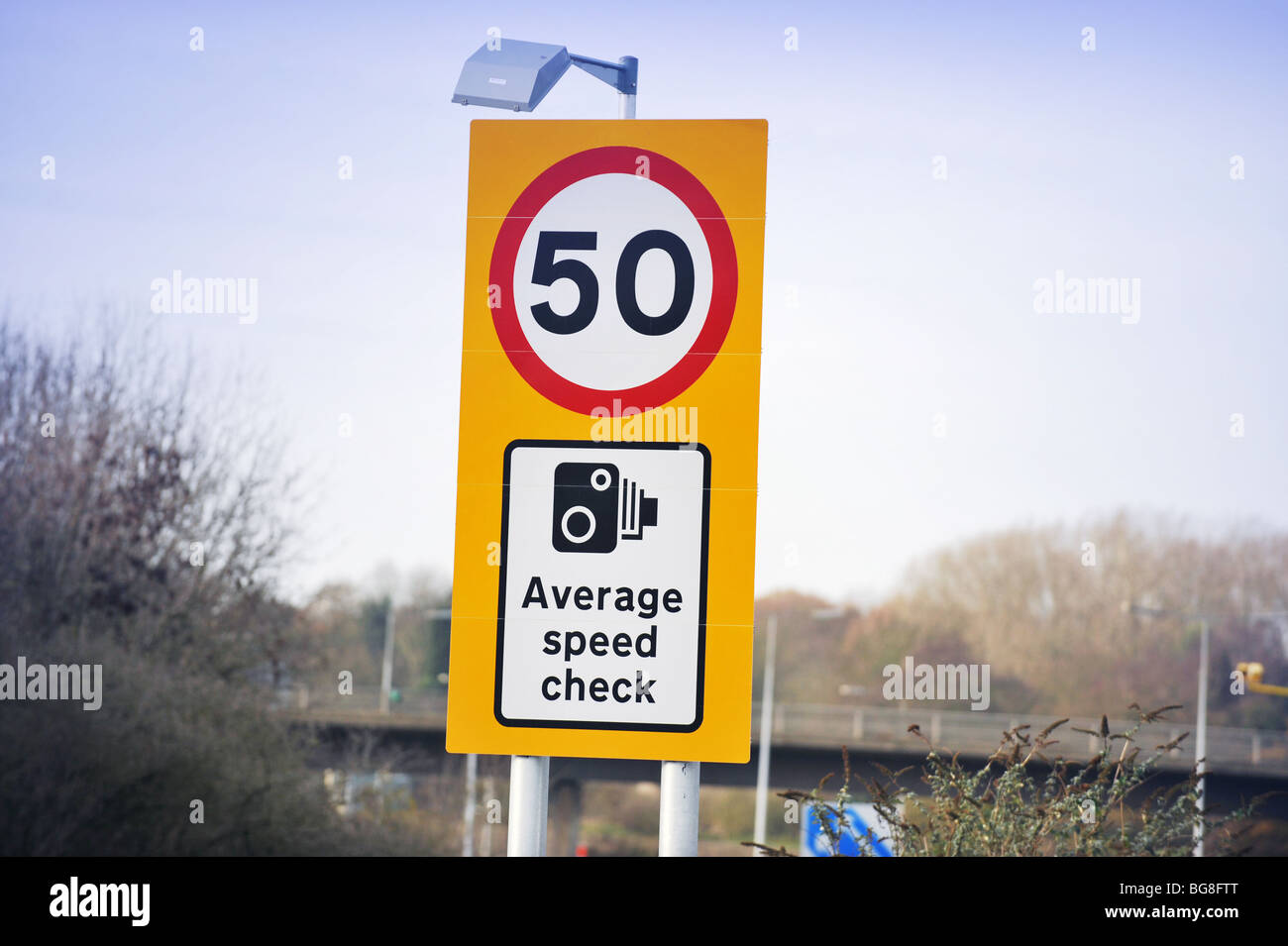 50 Mile an hour Average speed camera warning sighn on the M3 motorway in Surrey England Stock Photo