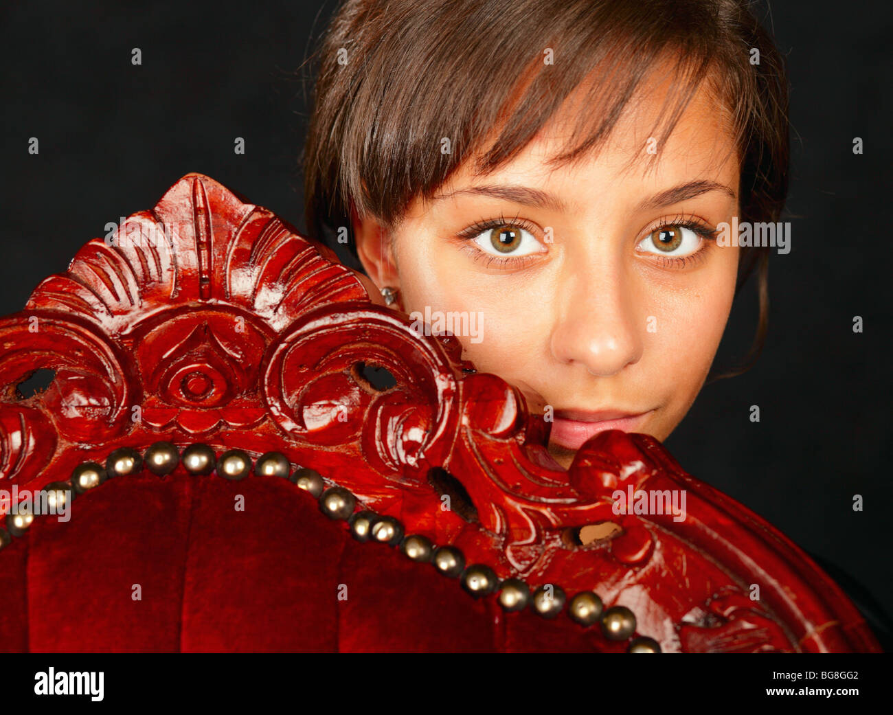 young beautiful girl and old chair Stock Photo Alamy