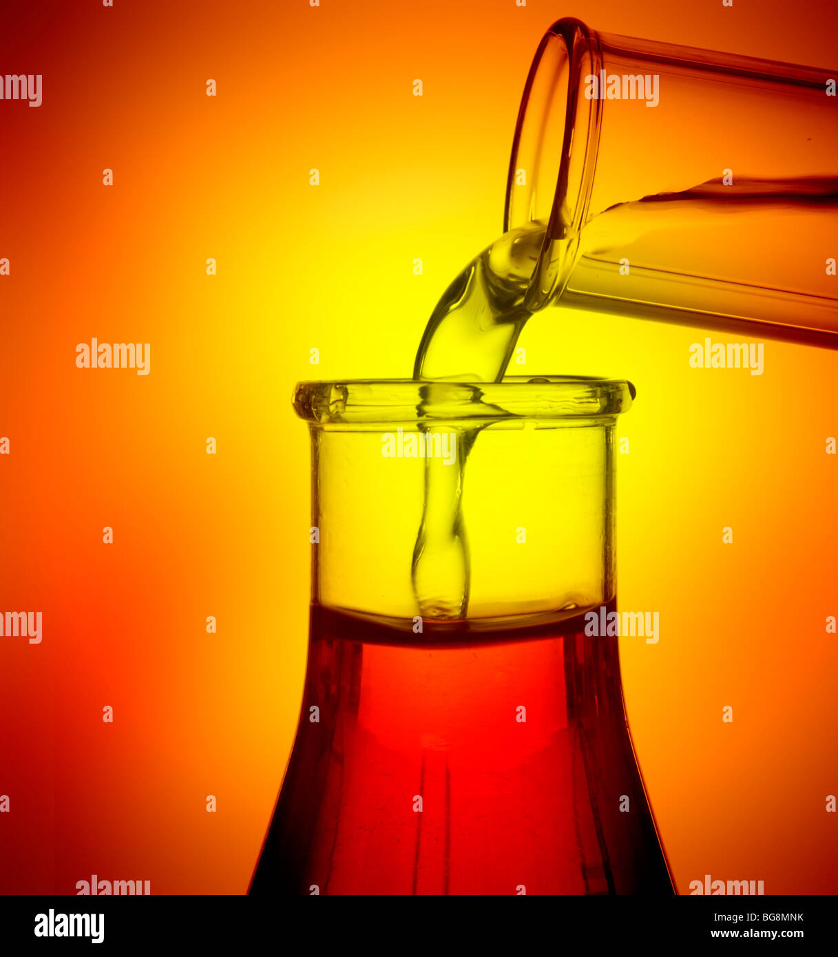 pouring liquid into Erlenmeyer flask Stock Photo Alamy
