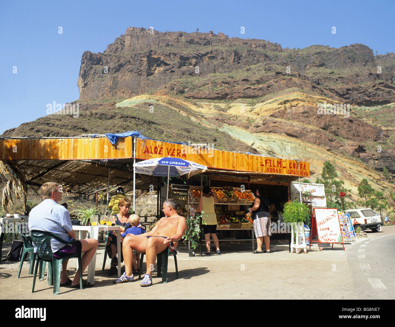 Mogan Gran Canaria Spain Europe. Roadside restaurant and coloured rocks in Barranco (gorge) de Veneguera Stock Photo