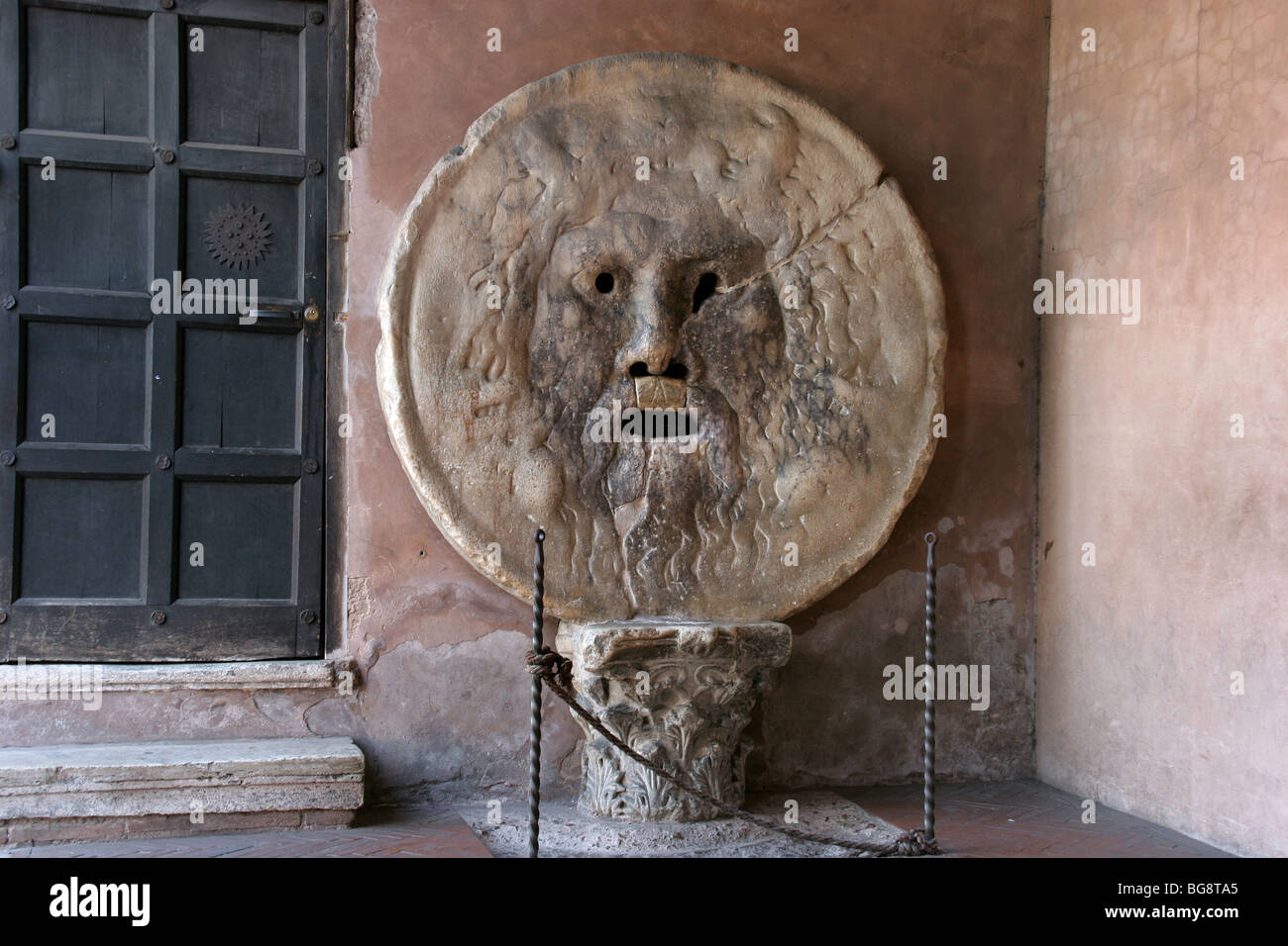 Roman Art. La Bocca della Verita 'The Mouth of Truth'. Ancient sculpture or masque of marble. I century A.D. Stock Photo