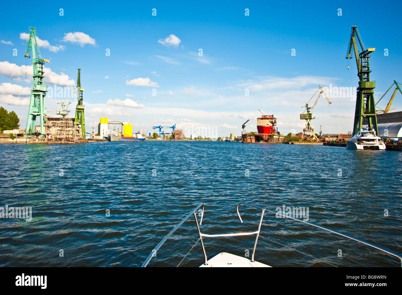 Bow of yacht approaching shipyards, Gdansk, Poland | Werften Danzig, Polen Stock Photo