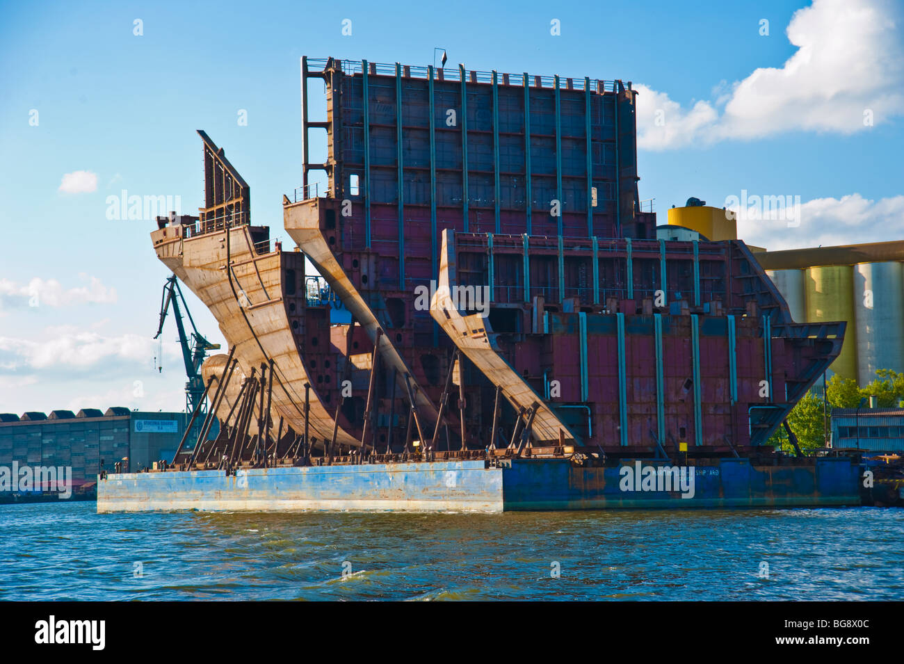 Shipyard with parts of hull on floating pontoon, Gdansk, Poland | Werften Danzig, Polen Stock Photo