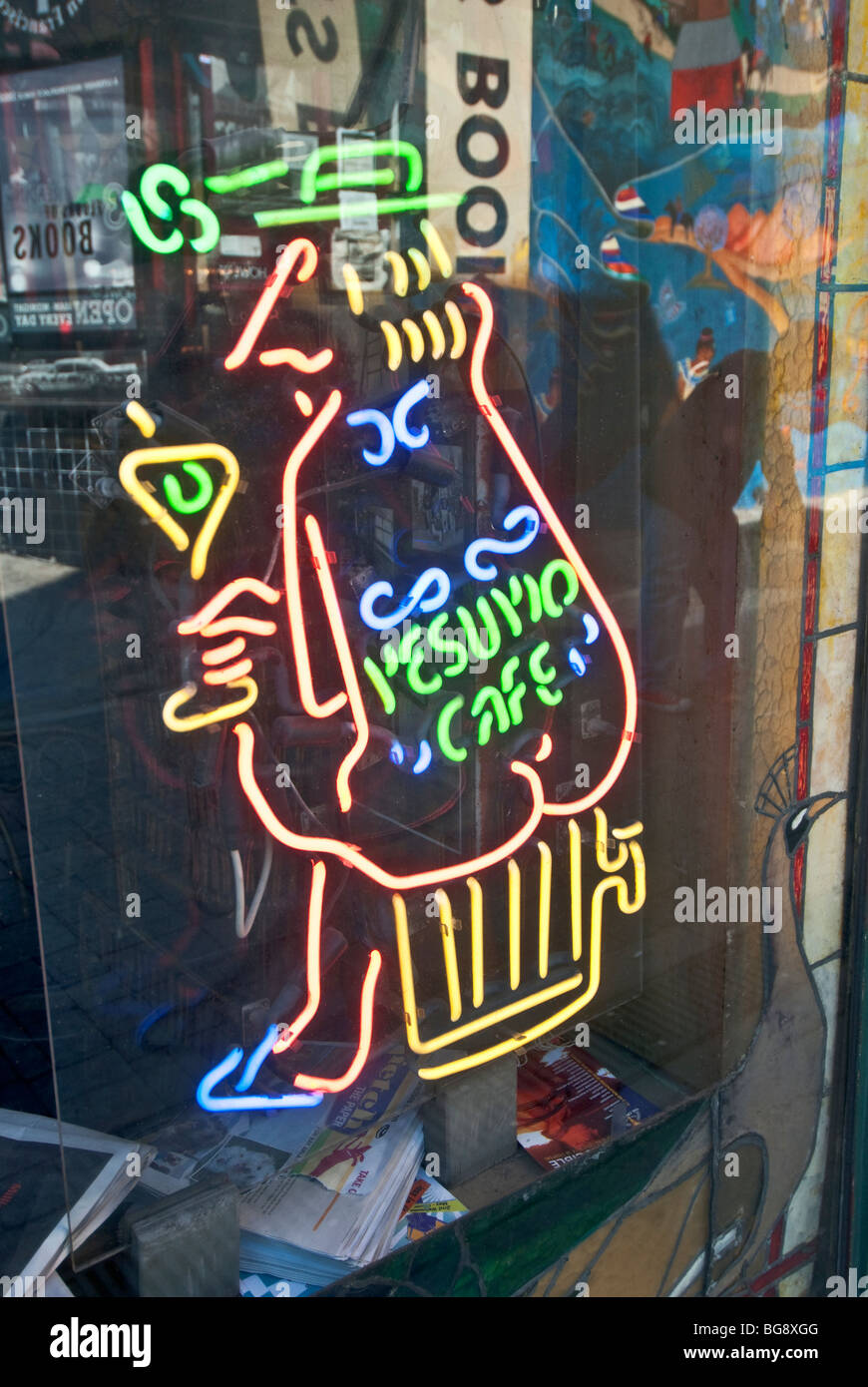 California San Francisco North Beach neighborhood Cafe Vesuvio neon sign reflection of City Lights Bookstore Stock Photo