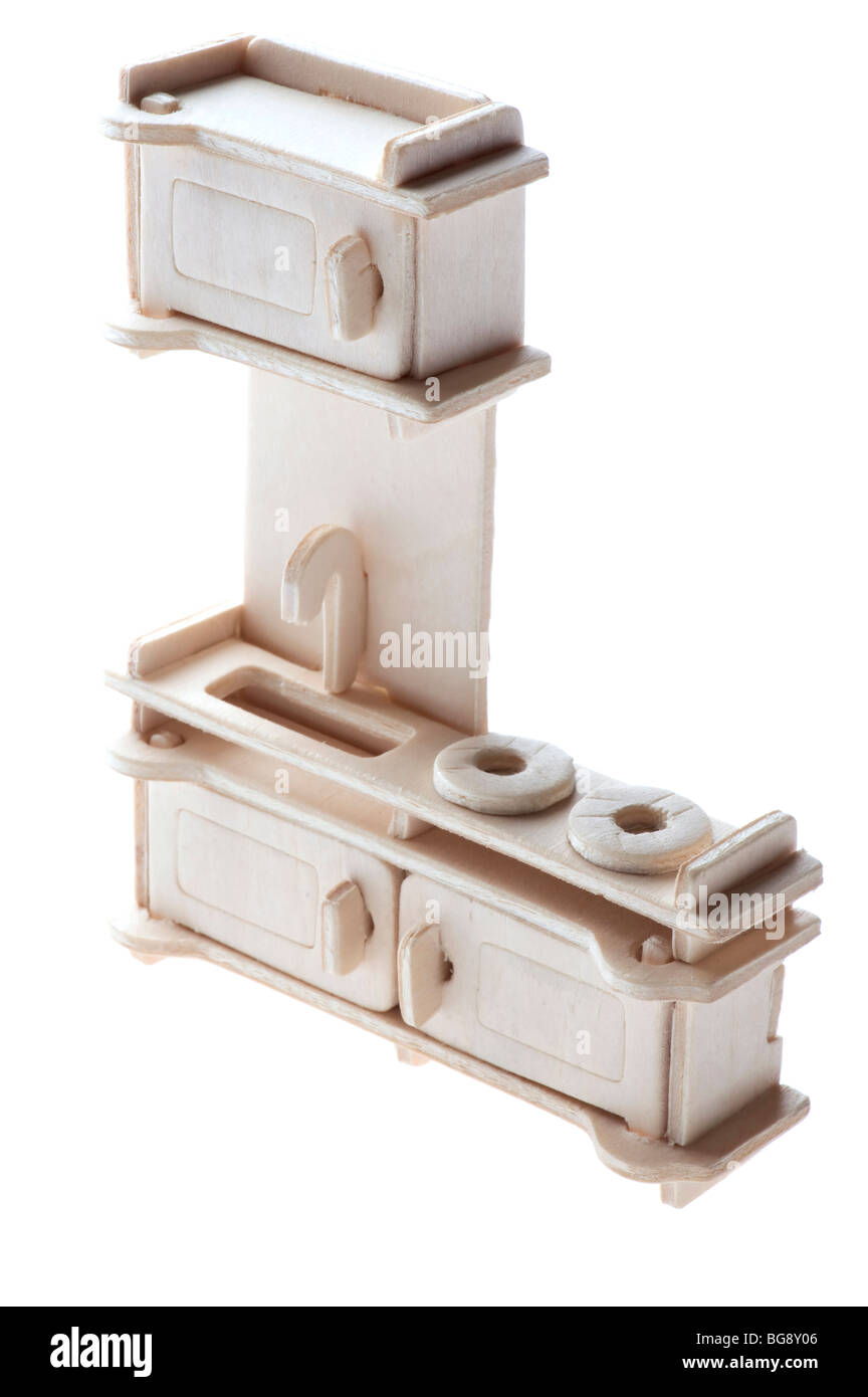 object on white Miniature wood Kitchen set toy macro Stock Photo