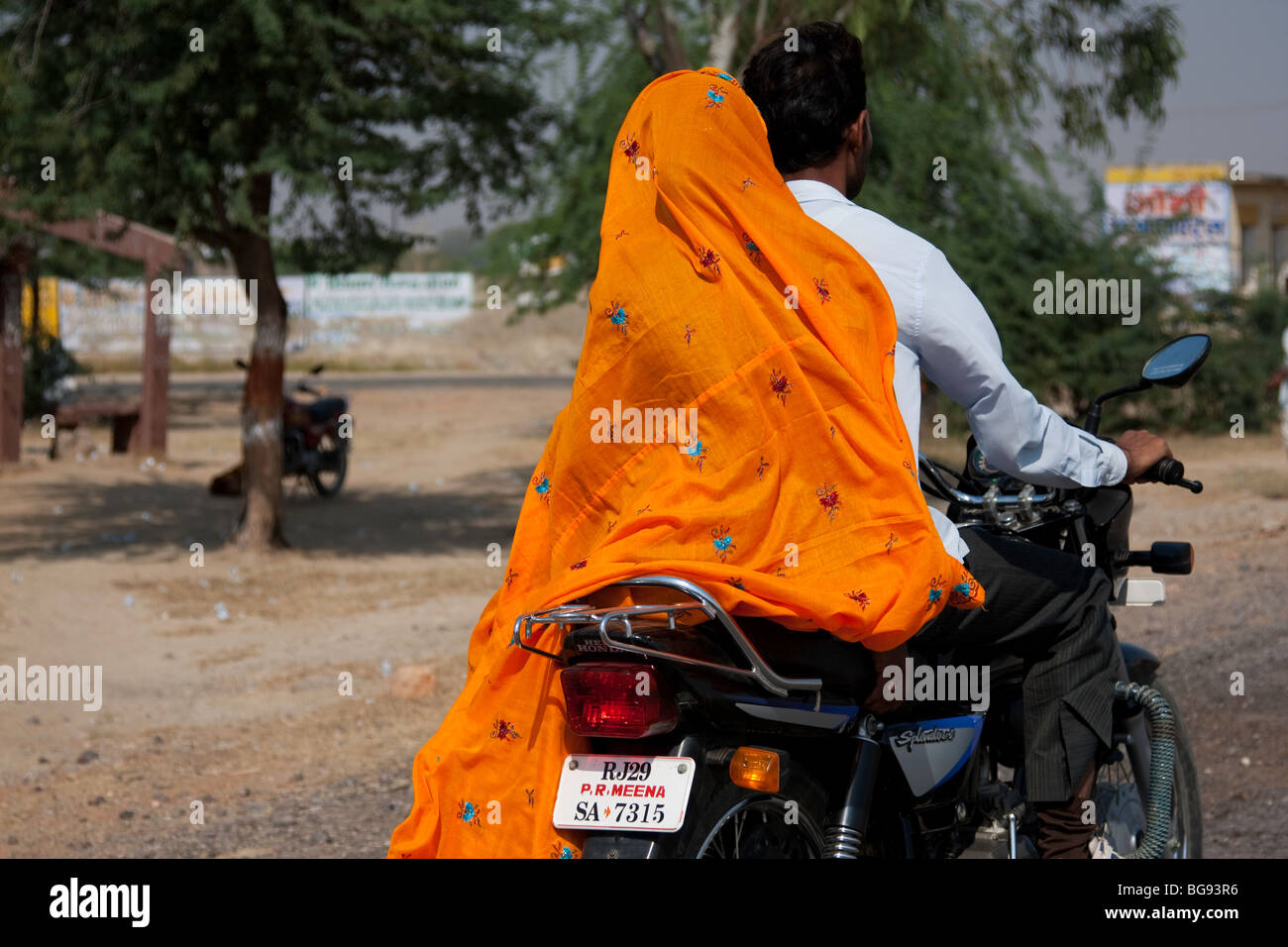 Indian woman on motor cycle Stock Photo - Alamy