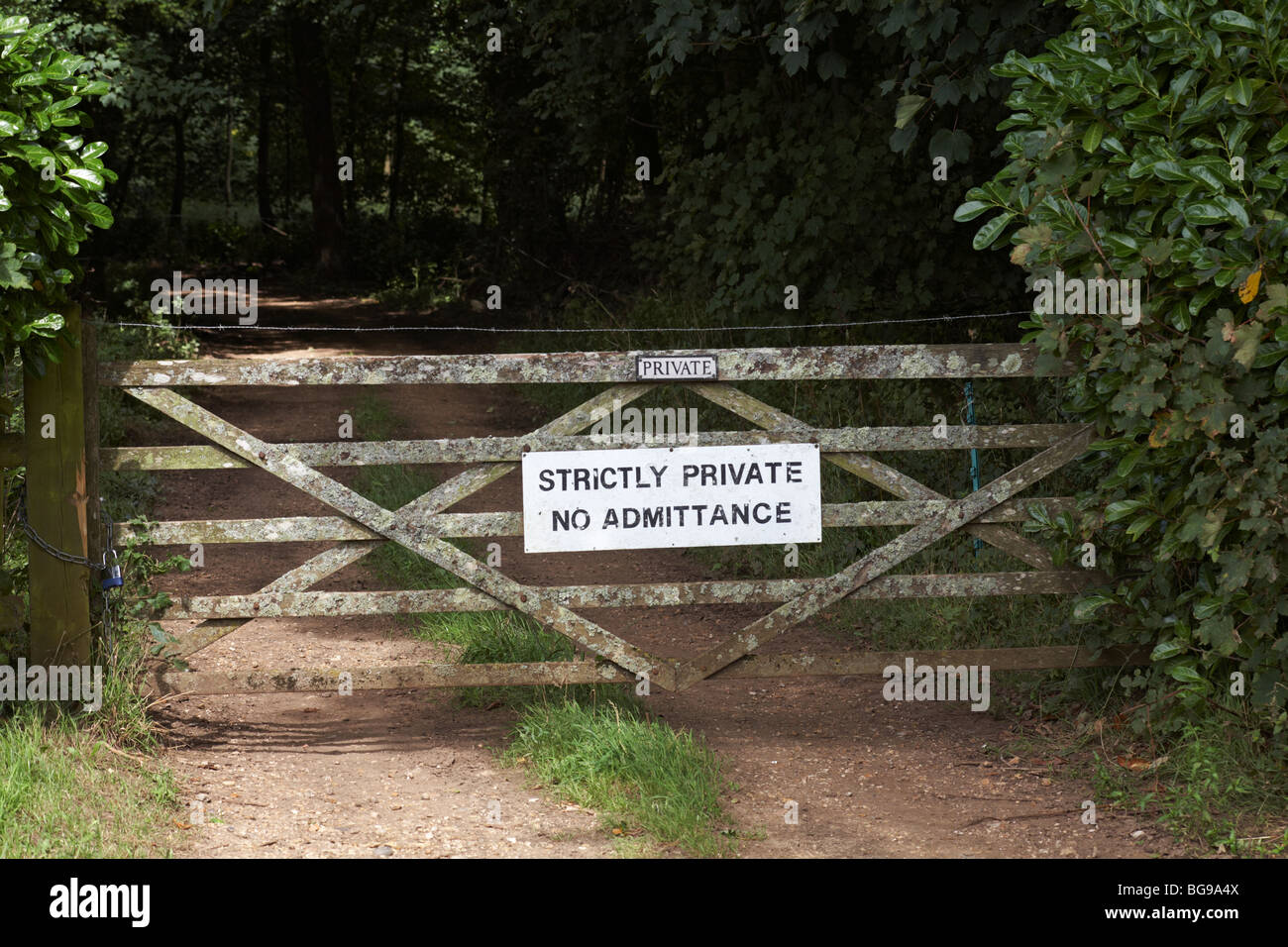 Strictly private no admittance signs on gate at Dorset in summer Stock Photo