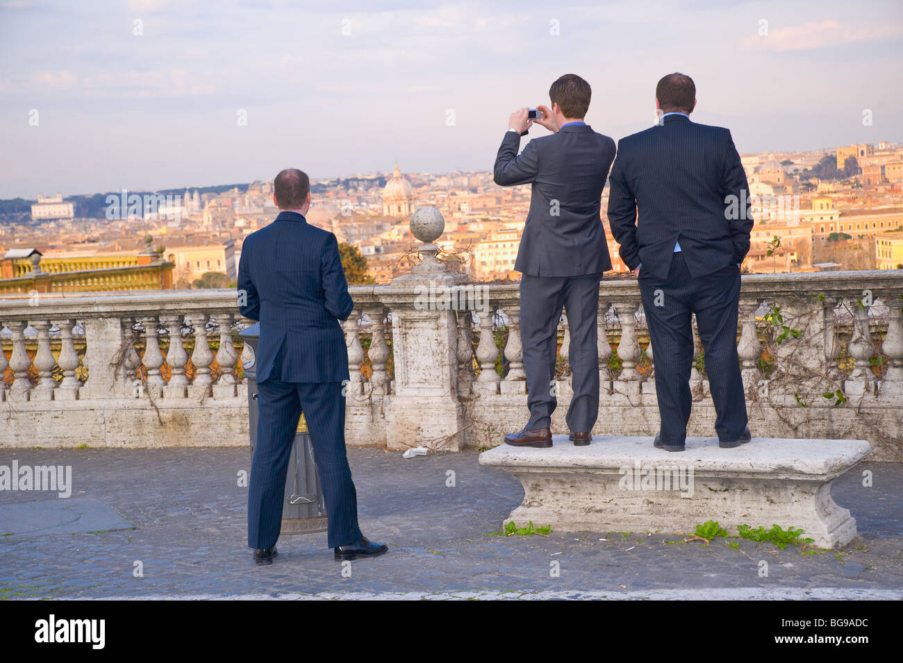 Men looking at the sweeping view of the Roman skyline from the Gianicolo Stock Photo