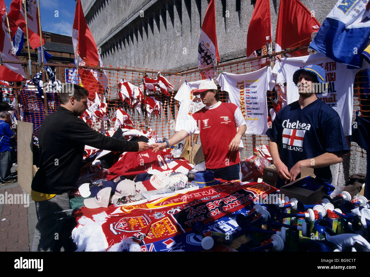 Street vendors selling football and scarves on match day Stock Photo - Alamy
