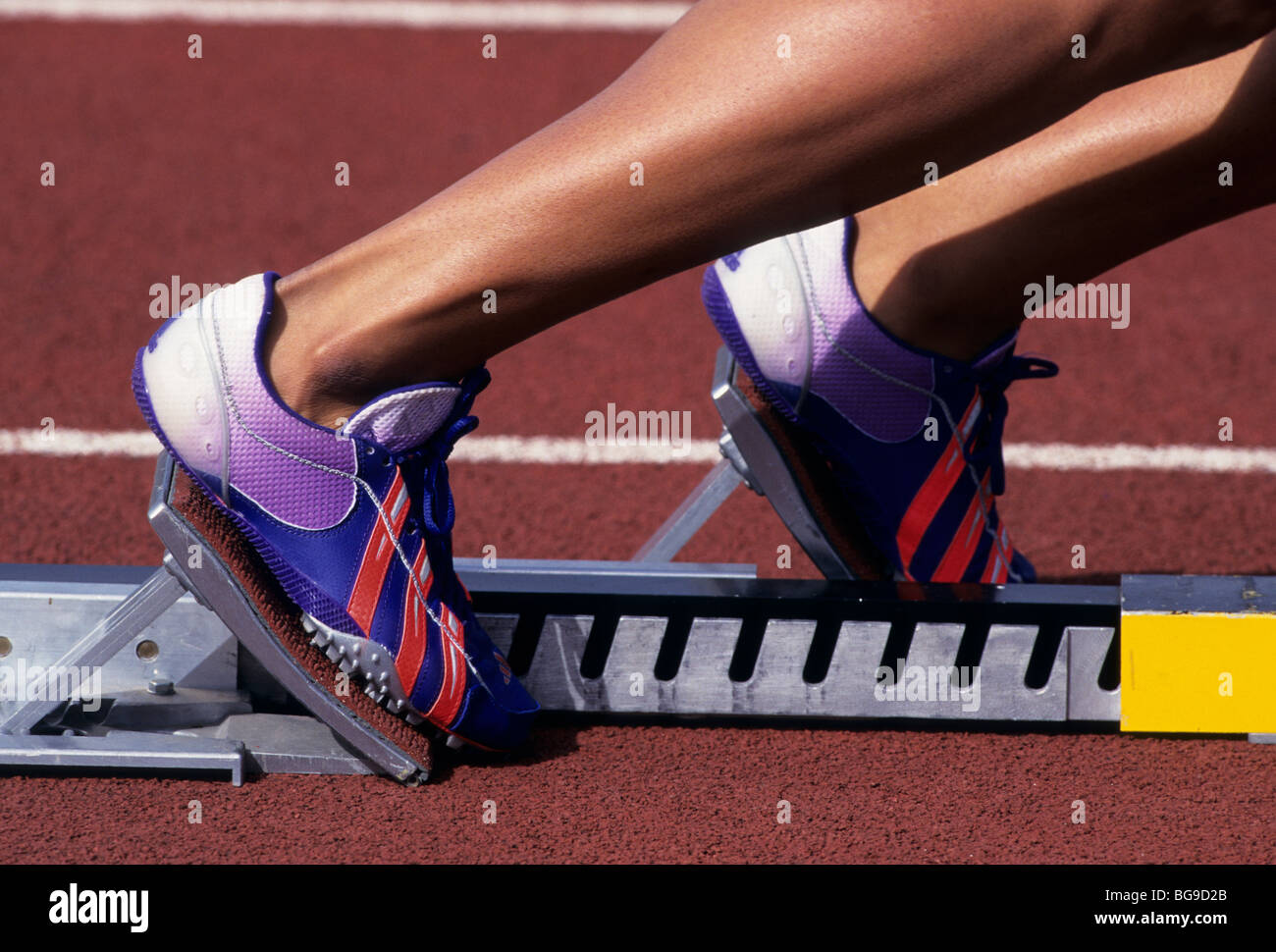 Sprinter in the starting block Stock Photo Alamy