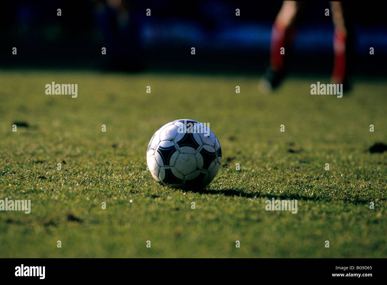 Football on a pitch Stock Photo - Alamy