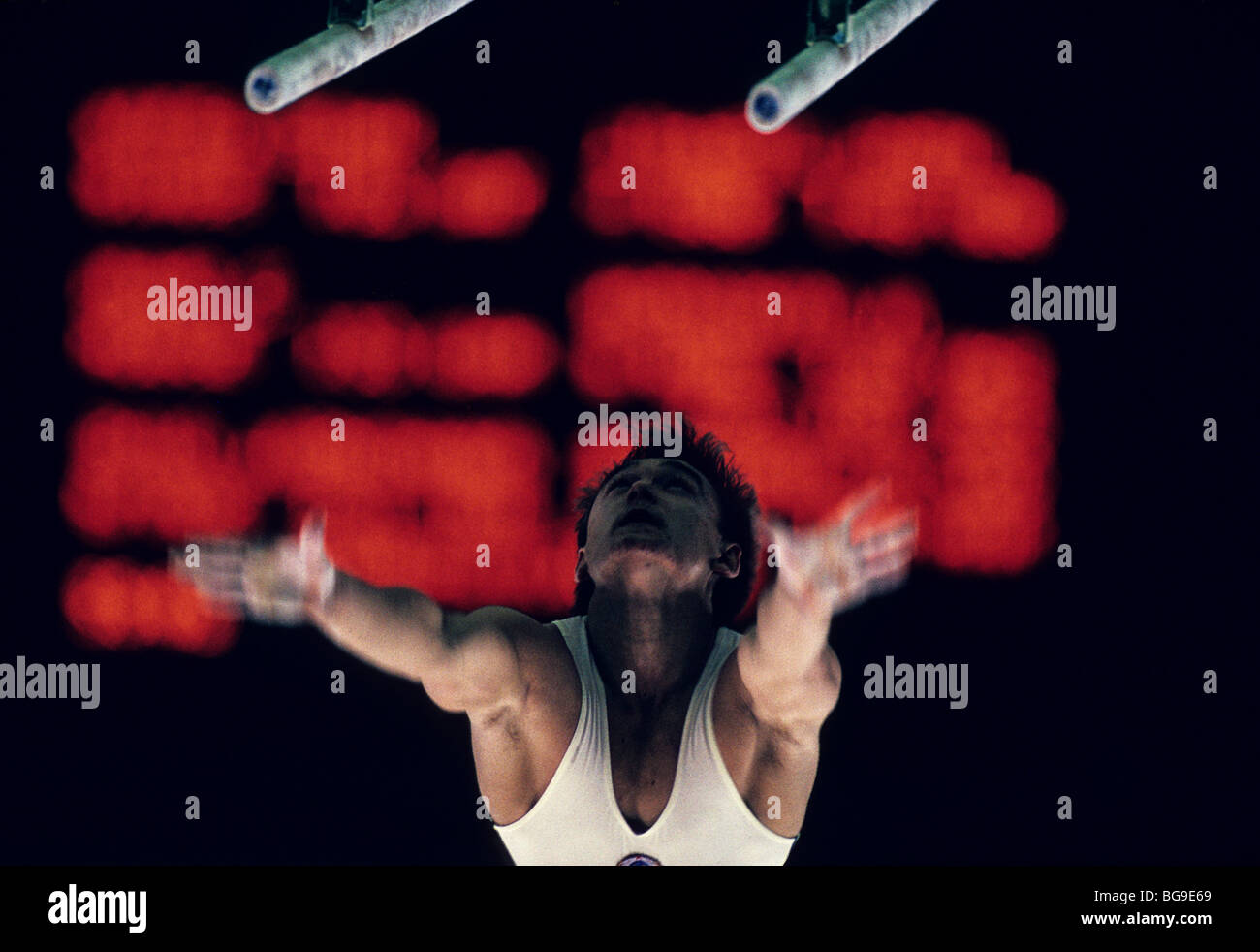 gymnast dismounts from parallel bars Stock Photo Alamy