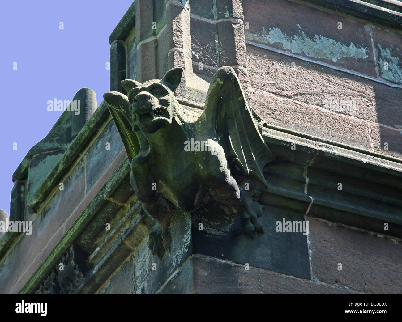 A gargoyle on an English church Stock Photo Alamy