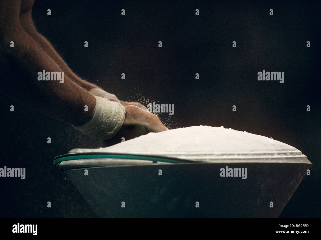 male gymnast chalking hands Stock Photo Alamy