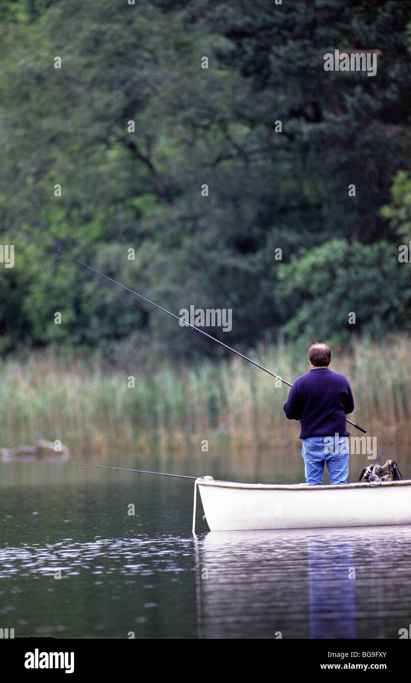 Man fishing from river bank hi-res stock photography and images