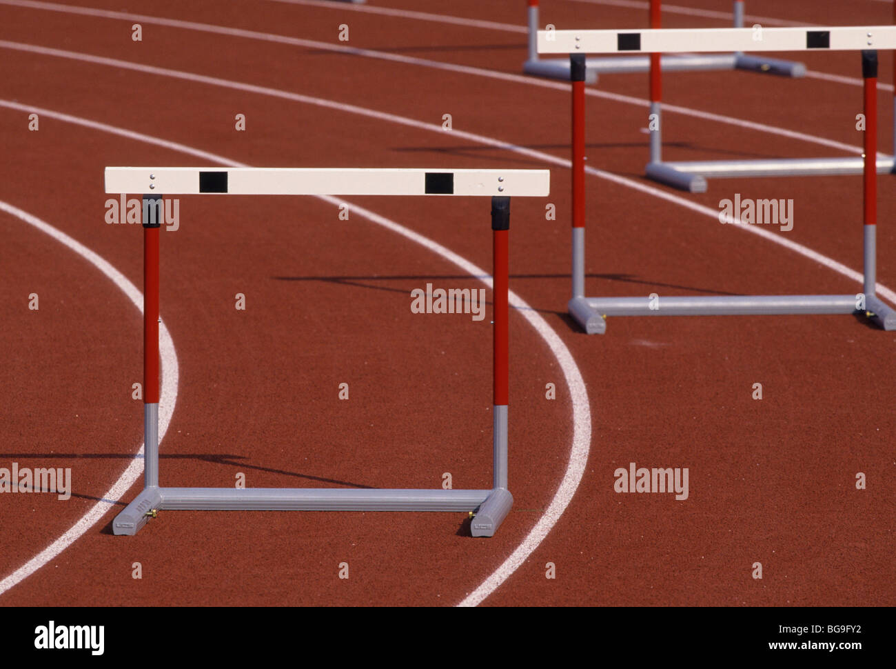 Hurdles on a running track Stock Photo Alamy