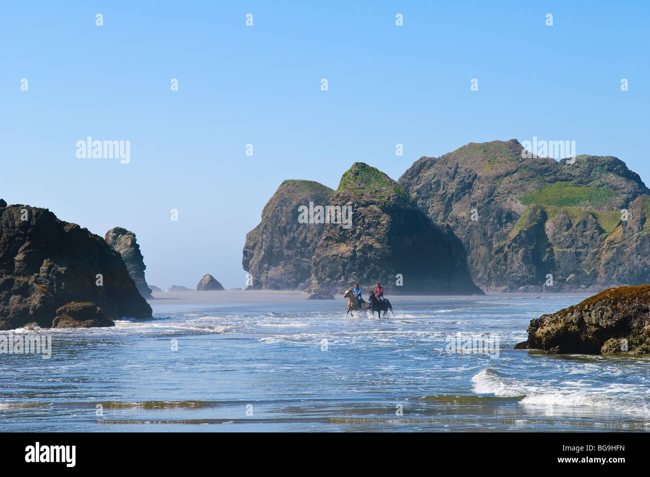 Horseback riding on the beach along the Oregon coast at Pistol River