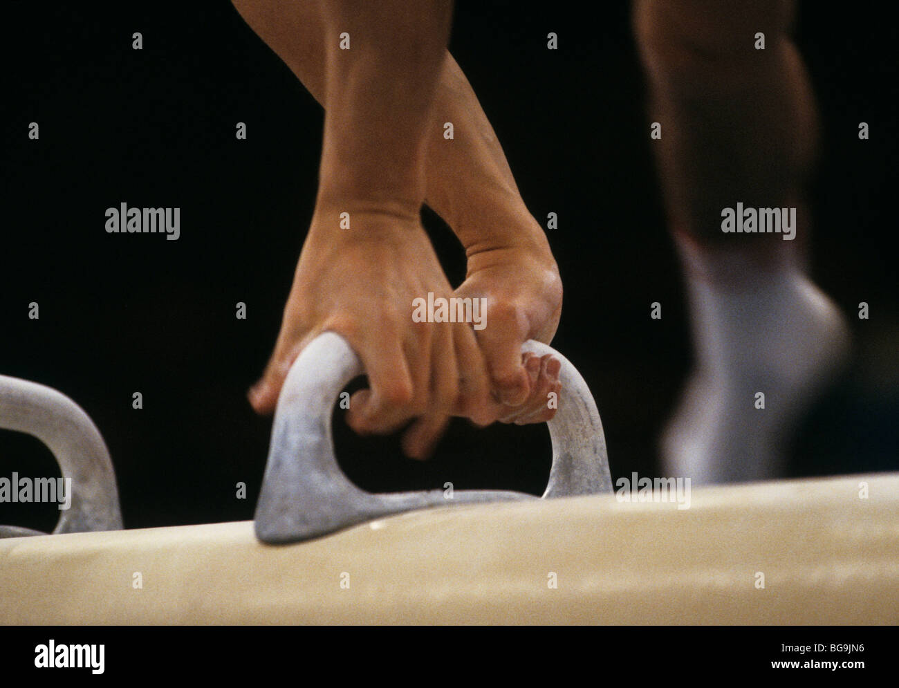 Close up of gymnast performing on pommel horse Stock Photo Alamy