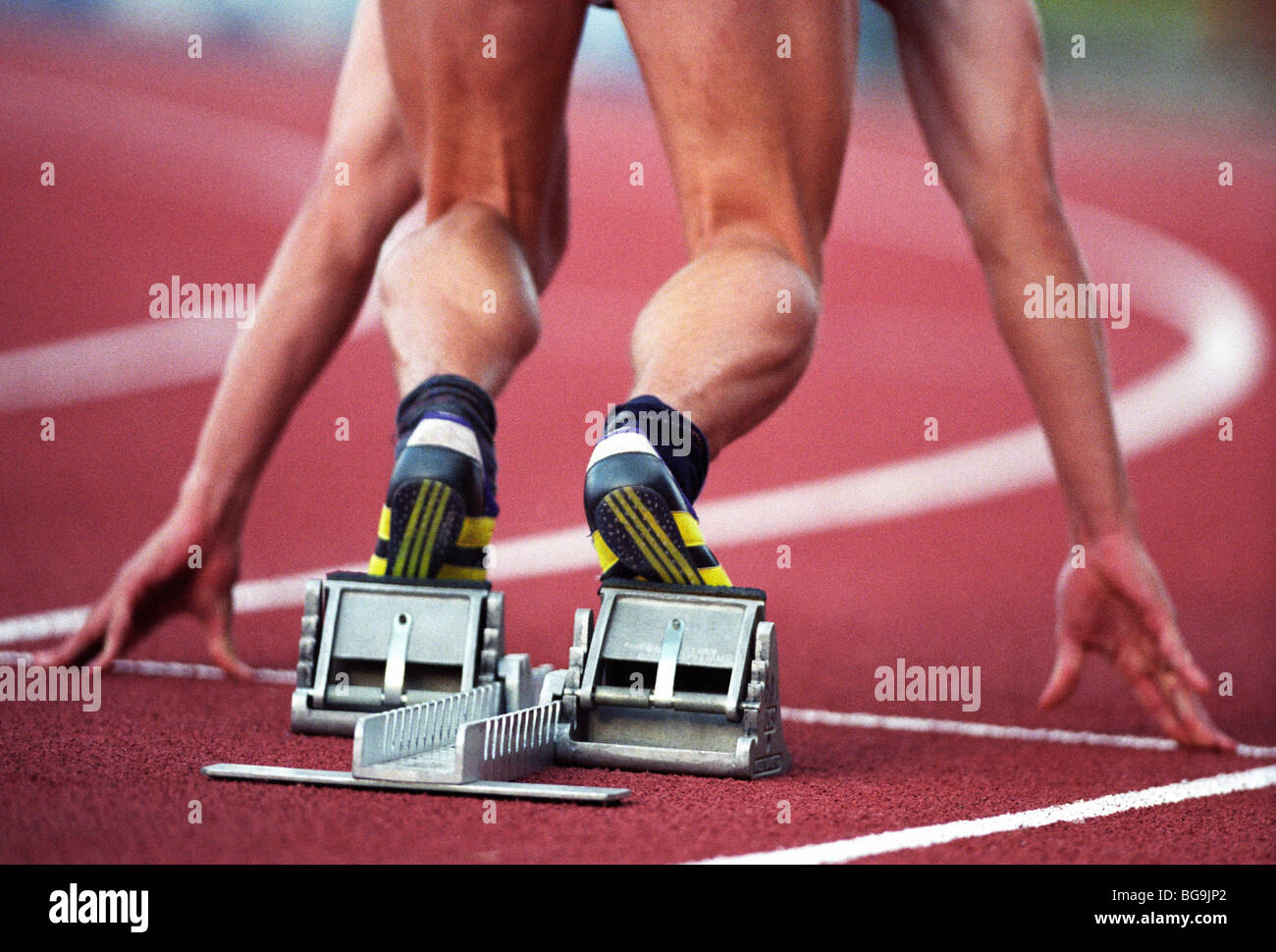 Sprinter in the starting block Stock Photo Alamy