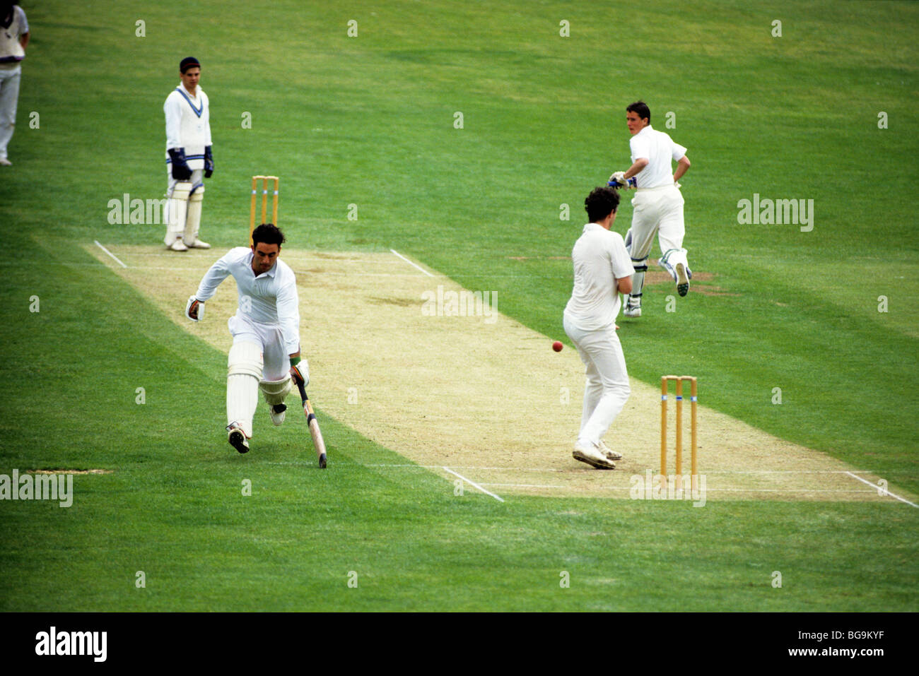 Cricketer scoring a run Stock Photo - Alamy