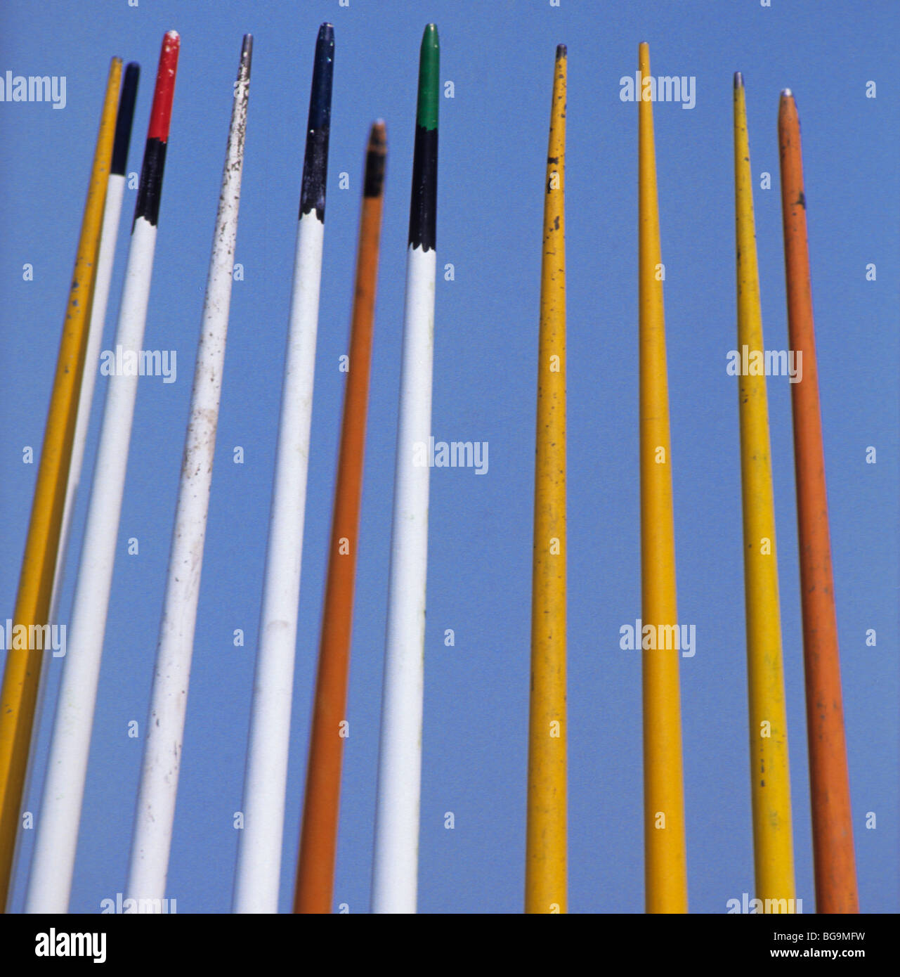 Javelins against a blue sky Stock Photo Alamy