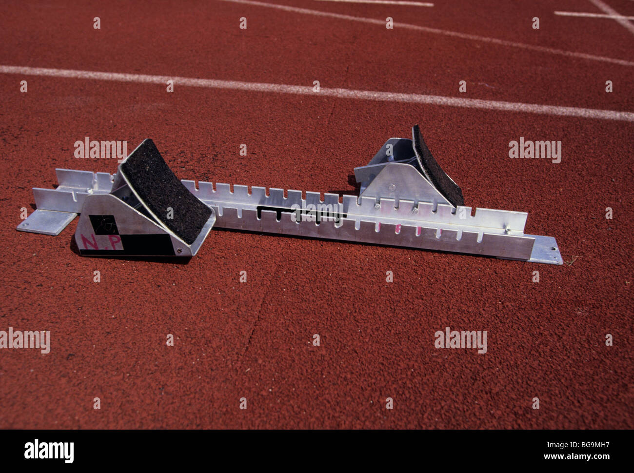 Starting block on an running track Stock Photo Alamy