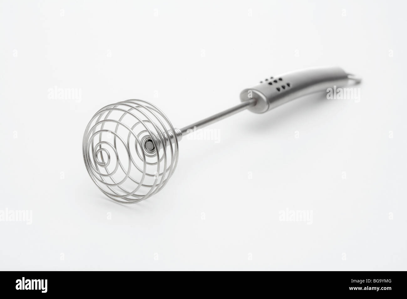 closeup of silver whisk isolated on white background Stock Photo