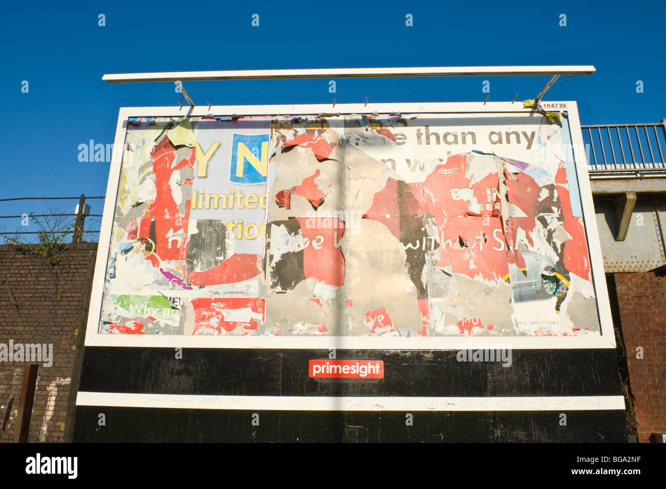 primesight billboard site with ripped and torn posters in Newport South Wales UK Stock Photo