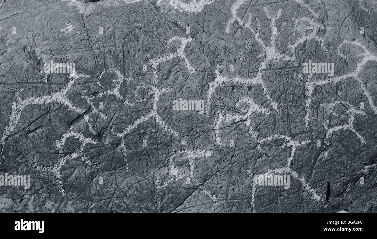 The ancient drawings on rocks Altai. The socalled Pazyryk culture. Stone Age. 1000 BC Stock