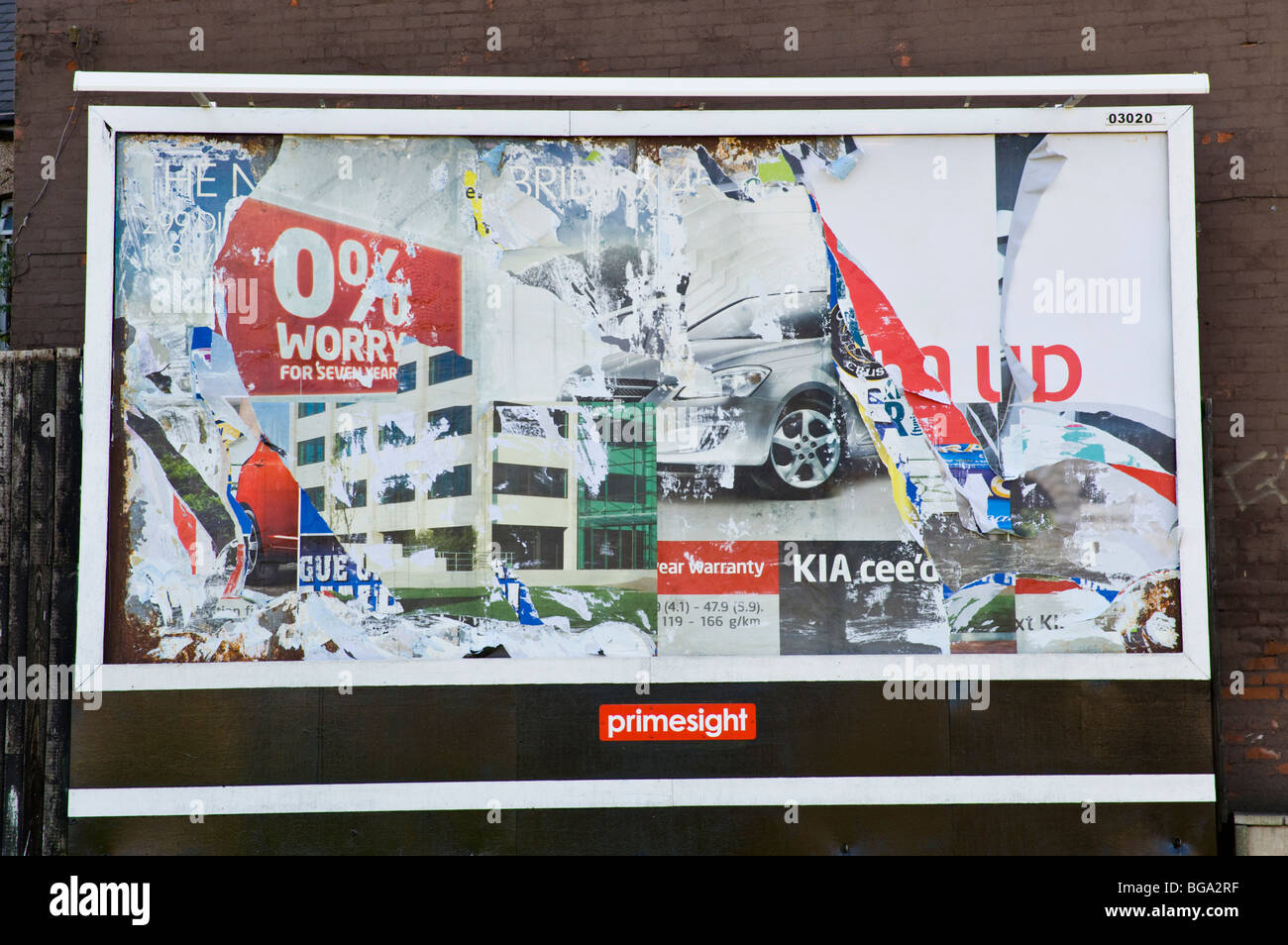 primesight billboard site with ripped and torn posters in Newport South Wales UK Stock Photo