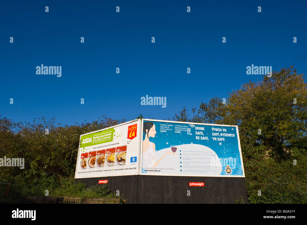 primesight billboard site featuring ASDA and Gwent Police DRINK SAFE posters in Newport South Wales UK Stock Photo