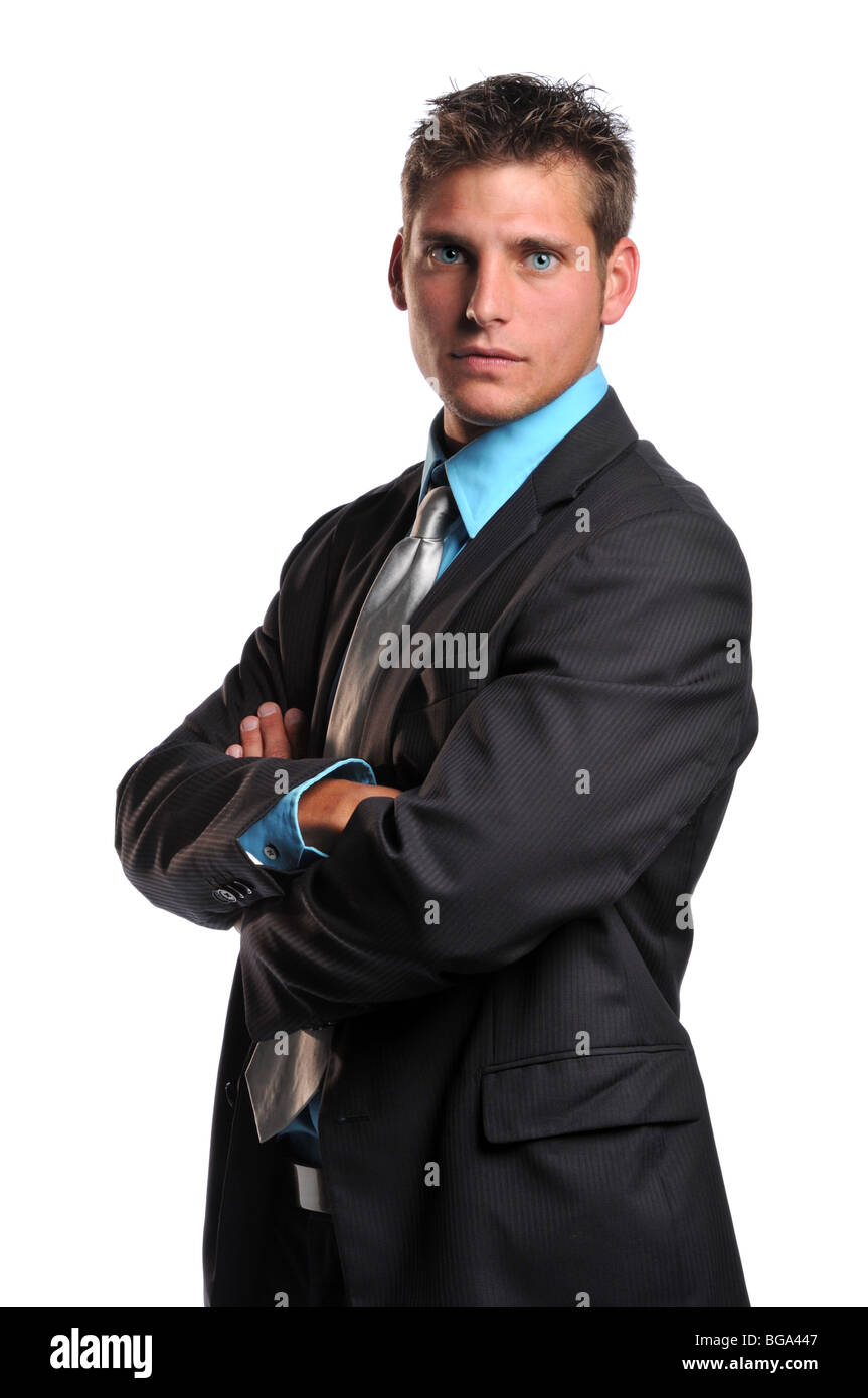 Young businessman's portrait with arms crossed isolated on a white ...