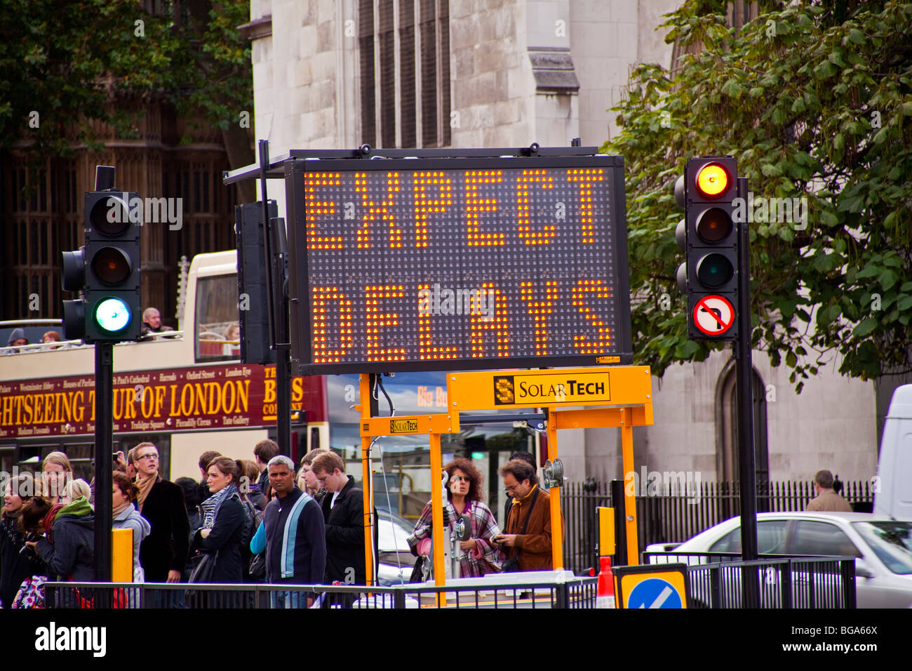 a sign showing 'expext delays' in westminster london england Uk Stock Photo