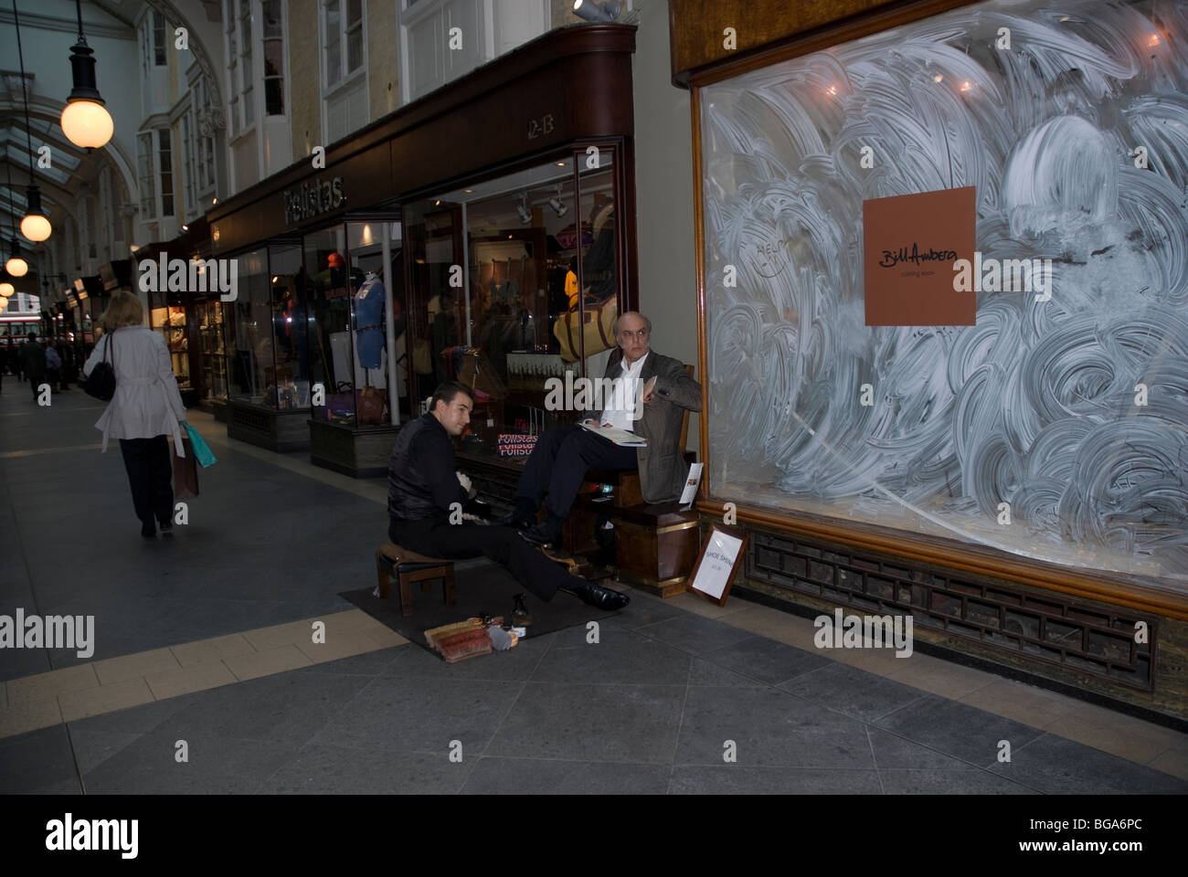 Shoe shiner in Burlington Arcade, Piccadilly London W1 Stock Photo